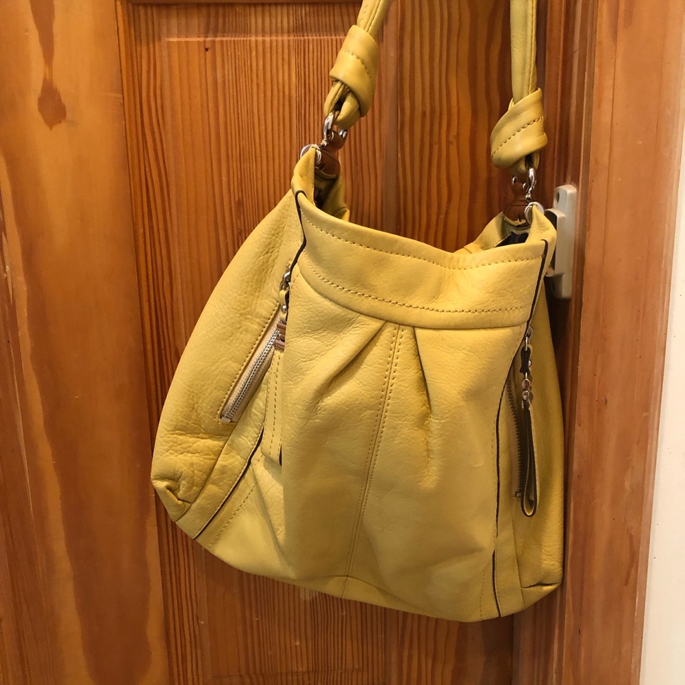 Gently used B Makowsky slouch Large pocket book